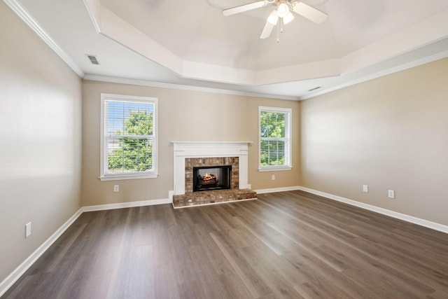 1030 Persimmon Dr, Spring Hill, TN 37174 - unfurnished living room featuring wood finished floors, a ceiling fan, a fireplace, baseboards, and ornamental molding