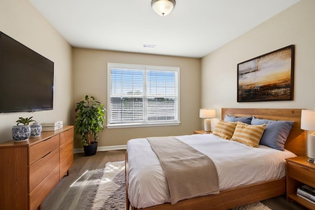 1030 Persimmon Dr, Spring Hill, TN 37174 - bedroom with wood finished floors and baseboards