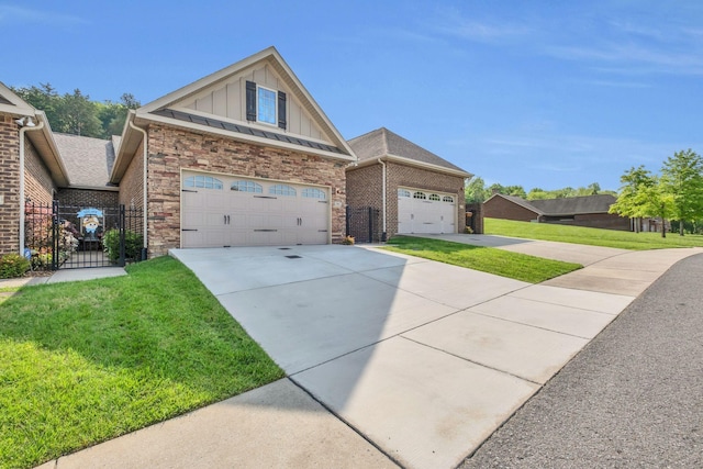 view of front of property featuring a garage, a front lawn, stone siding, board and batten siding, and driveway
