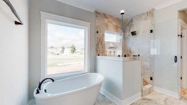 full bath with a soaking tub, a shower stall, and marble finish floor