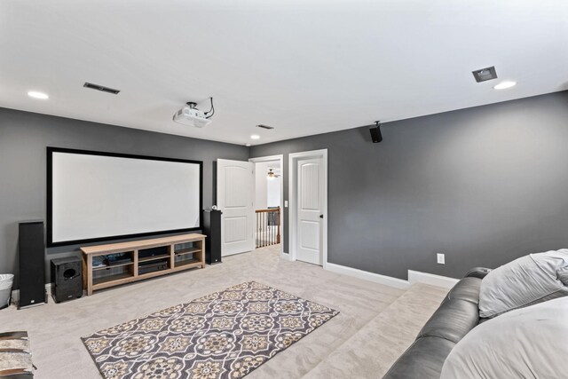 carpeted home theater featuring recessed lighting, baseboards, and visible vents