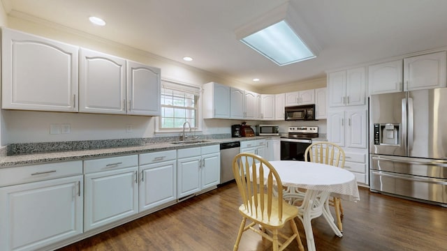 1213 Shackelford Dr, Mount Pleasant, TN 38474 - kitchen with crown molding, a sink, white cabinets, and stainless steel appliances