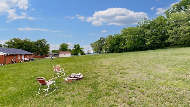 1213 Shackelford Dr, Mount Pleasant, TN 38474 - view of yard with an outdoor fire pit