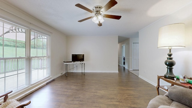 1213 Shackelford Dr, Mount Pleasant, TN 38474 - living room with baseboards, a ceiling fan, crown molding, and wood finished floors