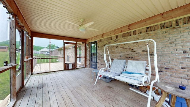 1213 Shackelford Dr, Mount Pleasant, TN 38474 - unfurnished sunroom featuring a ceiling fan