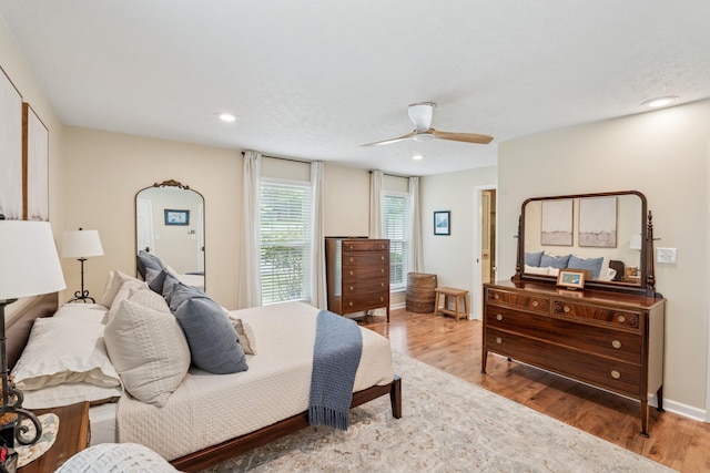 319 Powder Mill Dr, Ashland City, TN 37015 - bedroom with baseboards, recessed lighting, ceiling fan, and wood finished floors