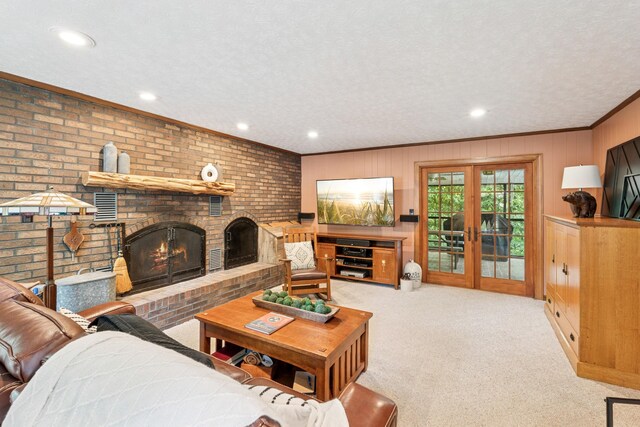 319 Powder Mill Dr, Ashland City, TN 37015 - carpeted living room featuring a textured ceiling, crown molding, a fireplace, wood walls, and recessed lighting