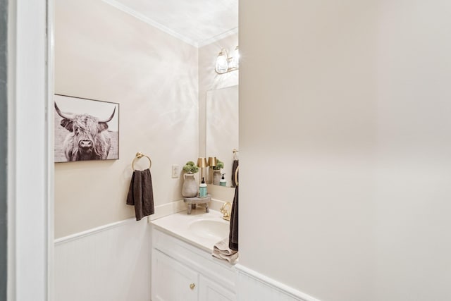 319 Powder Mill Dr, Ashland City, TN 37015 - bathroom featuring crown molding, a wainscoted wall, and vanity