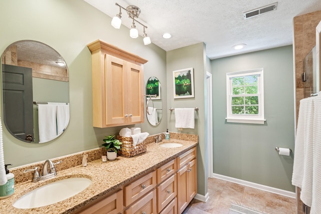 319 Powder Mill Dr, Ashland City, TN 37015 - full bathroom with a sink, baseboards, double vanity, and visible vents