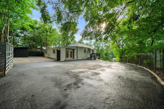 27 Cameo Dr, Nashville, TN 37211 - exterior space featuring aphalt driveway, fence, and french doors