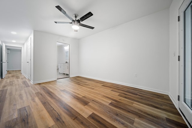27 Cameo Dr, Nashville, TN 37211 - unfurnished bedroom with connected bathroom, baseboards, ceiling fan, and wood finished floors