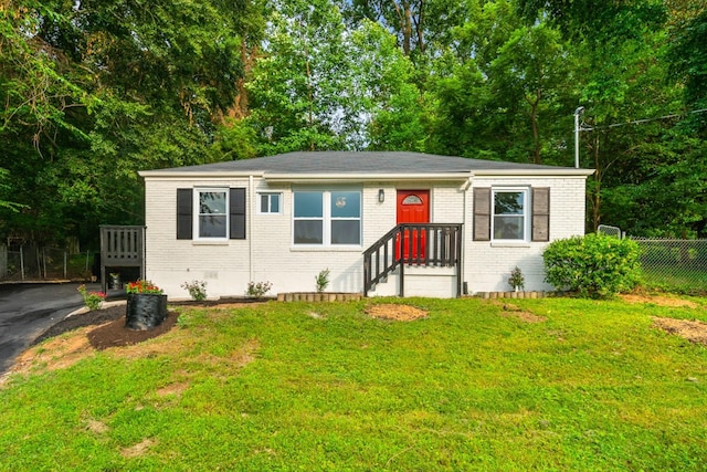 27 Cameo Dr, Nashville, TN 37211 - view of front facade featuring fence, crawl space, a front lawn, and brick siding
