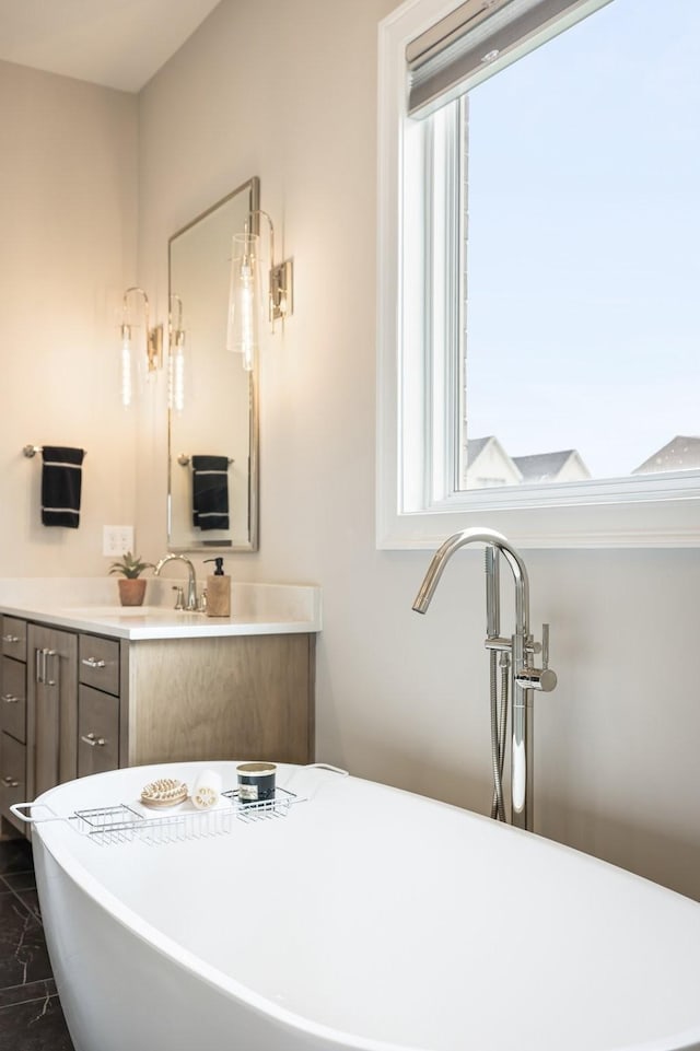 121 Dylan Woods Dr, Nolensville, TN 37135 - full bath featuring vanity, a soaking tub, and marble finish floor