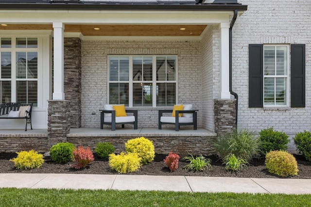 121 Dylan Woods Dr, Nolensville, TN 37135 - doorway to property with a porch and brick siding