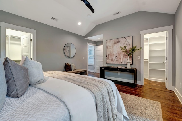 503B Acklen Park Dr, Nashville, TN 37205 - bedroom with visible vents, a walk in closet, lofted ceiling, and wood finished floors