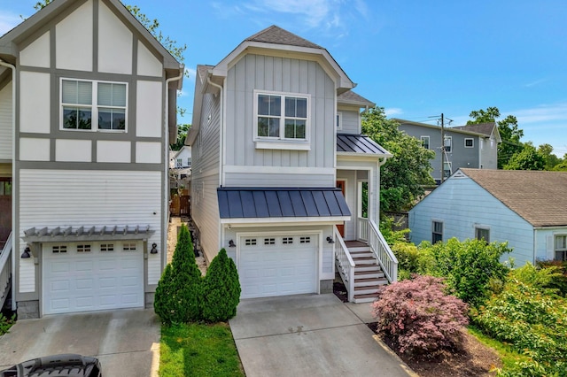 503B Acklen Park Dr, Nashville, TN 37205 - view of front of home with a garage, board and batten siding, stairway, and a standing seam roof