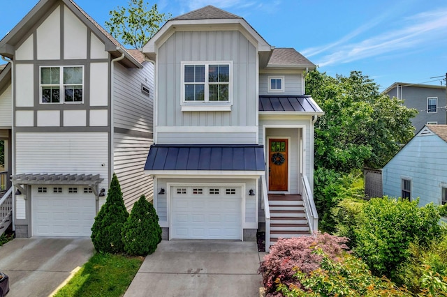 503B Acklen Park Dr, Nashville, TN 37205 - view of front facade featuring a standing seam roof, board and batten siding, an attached garage, and driveway