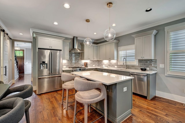 503B Acklen Park Dr, Nashville, TN 37205 - kitchen with a sink, ornamental molding, stainless steel appliances, and wall chimney exhaust hood