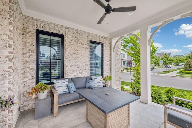 view of patio / terrace featuring a porch, an outdoor living space, and ceiling fan