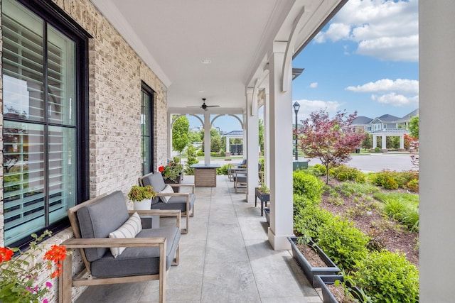 view of patio / terrace featuring covered porch and ceiling fan