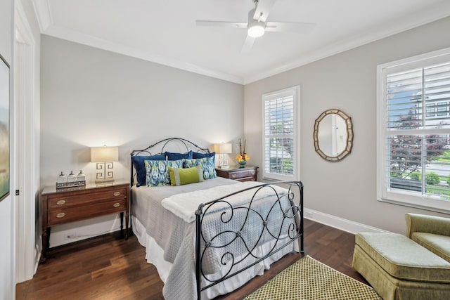 bedroom with crown molding, baseboards, ceiling fan, and dark wood finished floors