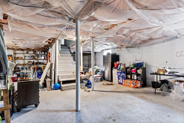 3610 Gleason Dr, Chattanooga, TN 37412 - unfinished below grade area with freestanding refrigerator and stairway