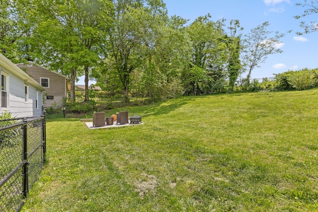 3610 Gleason Dr, Chattanooga, TN 37412 - view of yard featuring a patio, fence, and an outdoor fire pit