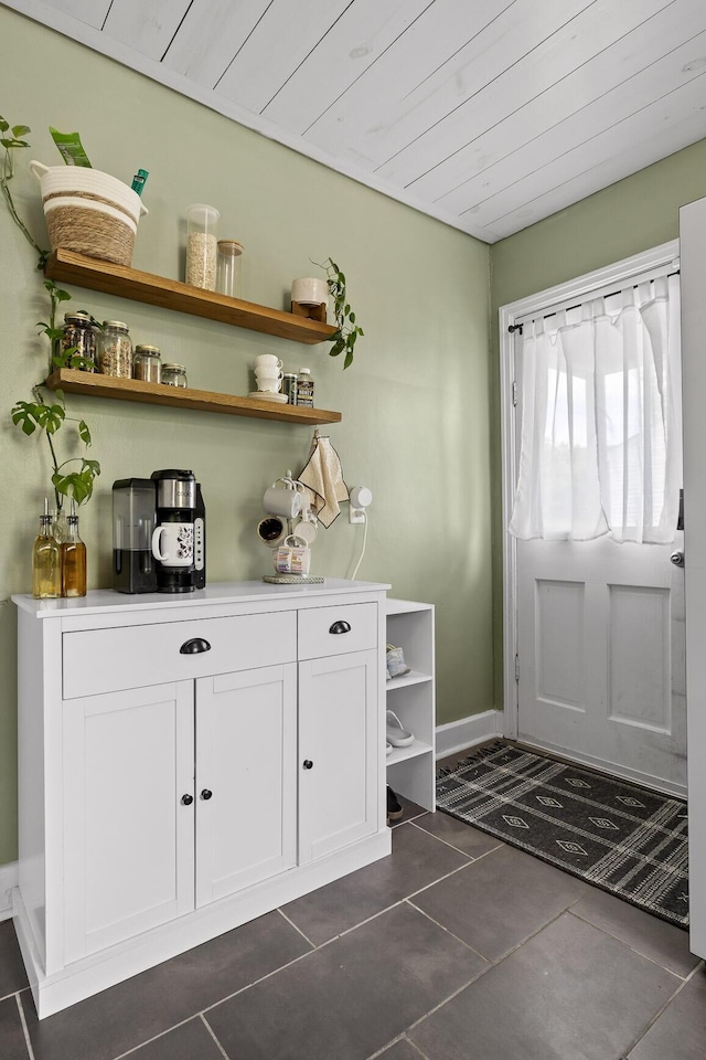 3610 Gleason Dr, Chattanooga, TN 37412 - interior space featuring dark tile patterned floors and baseboards