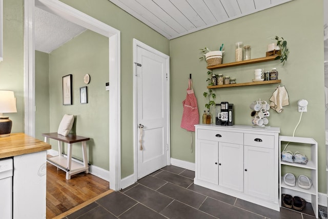 3610 Gleason Dr, Chattanooga, TN 37412 - interior space featuring dark tile patterned floors and baseboards