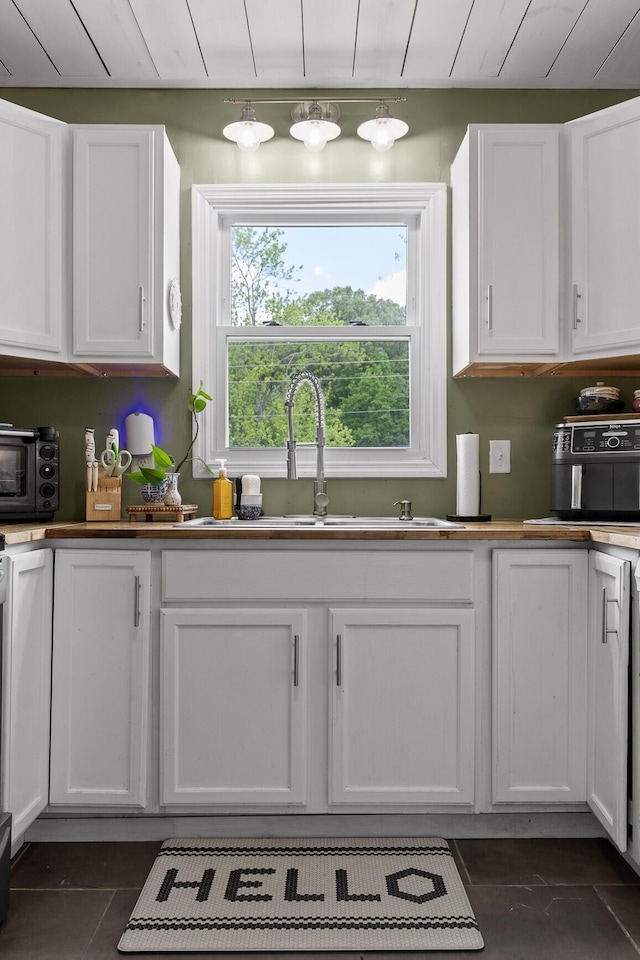 3610 Gleason Dr, Chattanooga, TN 37412 - kitchen with a sink, white cabinetry, and a toaster