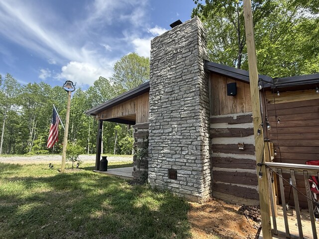 8901 Primm Springs Rd, Primm Springs, TN 38476 - view of property exterior with a chimney and a yard