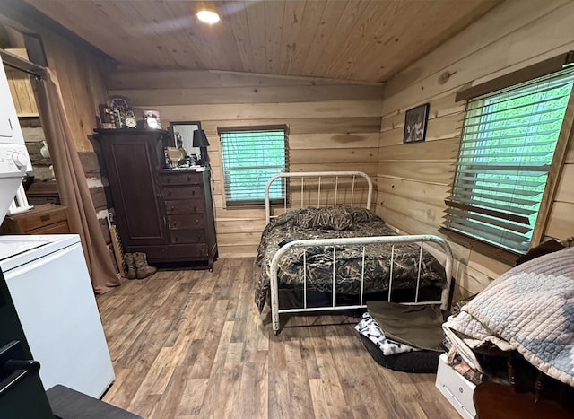 8901 Primm Springs Rd, Primm Springs, TN 38476 - bedroom with vaulted ceiling, wood walls, wood ceiling, and wood finished floors