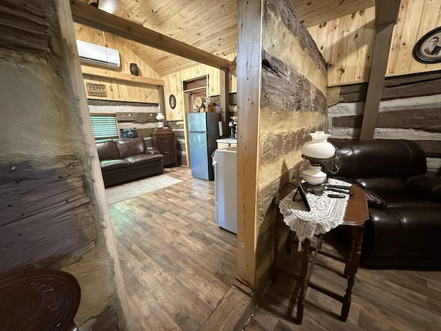 8901 Primm Springs Rd, Primm Springs, TN 38476 - interior space with a wall mounted air conditioner, wooden ceiling, wood finished floors, and lofted ceiling with beams