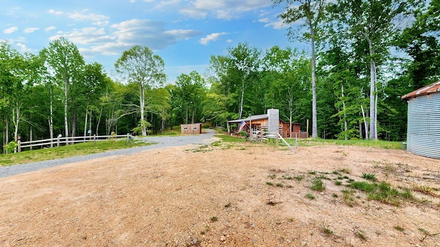 8901 Primm Springs Rd, Primm Springs, TN 38476 - view of yard featuring an outbuilding and fence