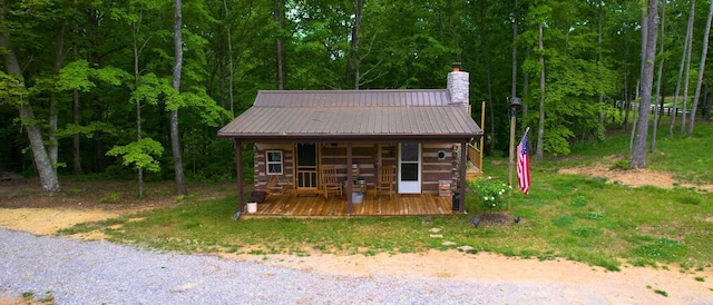 8901 Primm Springs Rd, Primm Springs, TN 38476 - view of outdoor structure with covered porch and a view of trees