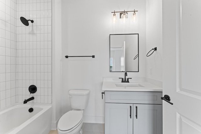 full bathroom featuring toilet, baseboards, bathing tub / shower combination, and vanity