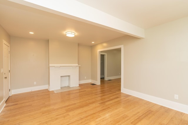 716 Larkin Ave, Chattanooga, TN 37411 - unfurnished living room featuring light wood-style floors, baseboards, and recessed lighting