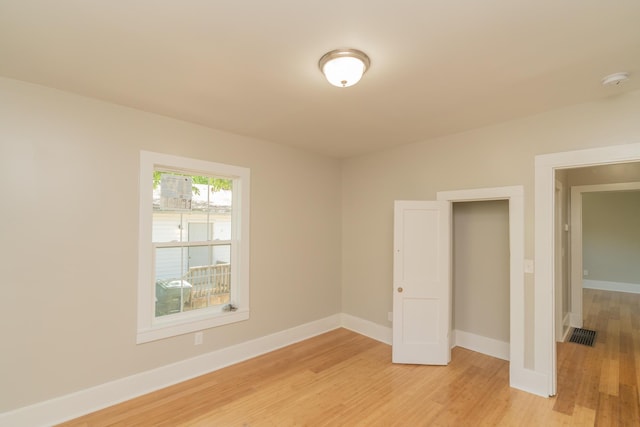716 Larkin Ave, Chattanooga, TN 37411 - unfurnished room with light wood-style floors, visible vents, and baseboards