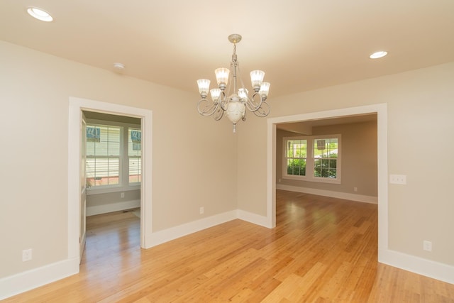 716 Larkin Ave, Chattanooga, TN 37411 - spare room with a chandelier, baseboards, light wood-style flooring, and recessed lighting