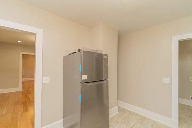 716 Larkin Ave, Chattanooga, TN 37411 - kitchen with freestanding refrigerator, baseboards, and recessed lighting