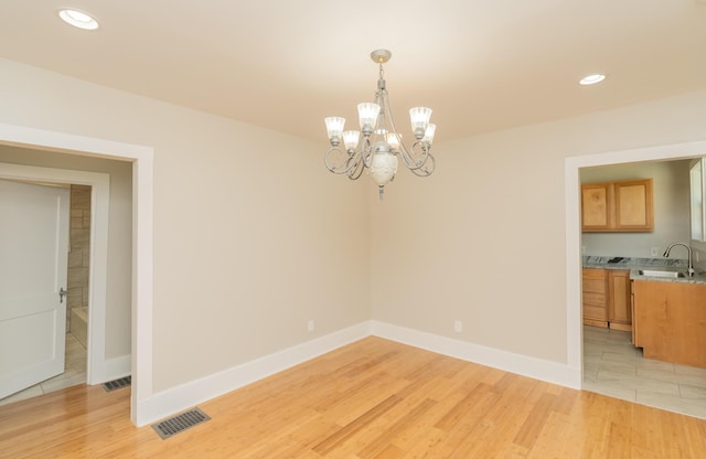 716 Larkin Ave, Chattanooga, TN 37411 - unfurnished dining area featuring recessed lighting, an inviting chandelier, visible vents, and a sink