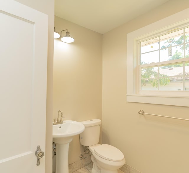716 Larkin Ave, Chattanooga, TN 37411 - half bathroom with a sink, tile patterned flooring, and toilet