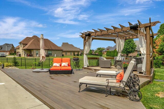 deck with a pergola, fence, and a residential view