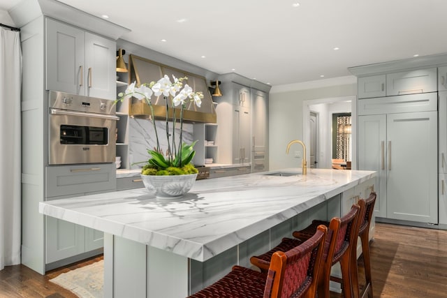 208 Carden Ave, Nashville, TN 37205 - kitchen with open shelves, dark wood-style flooring, light stone countertops, oven, and a sink