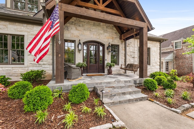 208 Carden Ave, Nashville, TN 37205 - property entrance featuring covered porch and stone siding