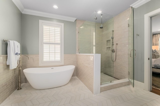 208 Carden Ave, Nashville, TN 37205 - full bath with a freestanding tub, tile walls, a wainscoted wall, a shower stall, and ensuite bath
