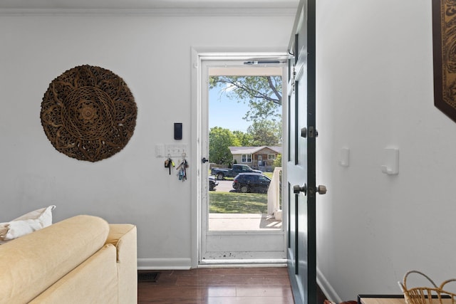 2821 Galesburg Dr, Nashville, TN 37217 - doorway to outside with baseboards, crown molding, dark wood-type flooring, and visible vents