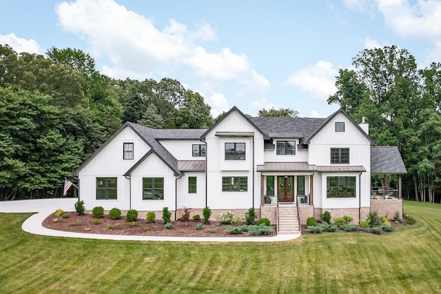 5750 Bunker Hill Rd, Cookeville, TN 38506 - modern farmhouse with a shingled roof, a front yard, a chimney, a standing seam roof, and metal roof