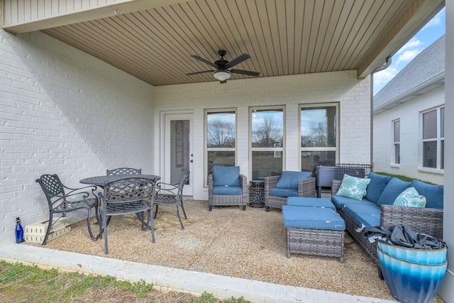 view of patio with ceiling fan, outdoor lounge area, and outdoor dining space
