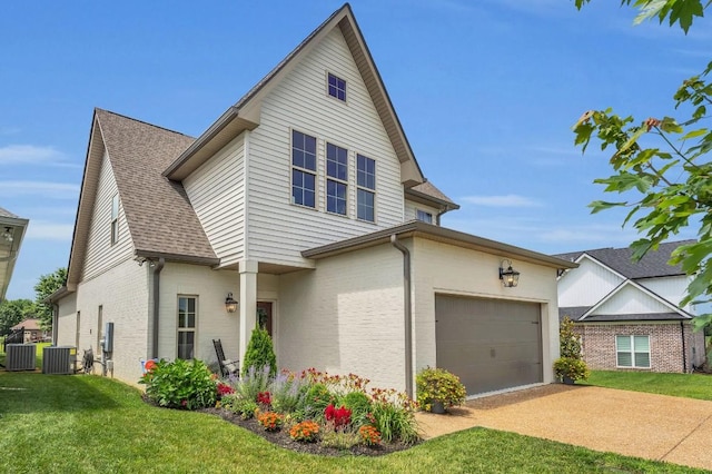 1572 John Galt Dr, Lebanon, TN 37087 - traditional-style home with driveway, brick siding, a front lawn, and a shingled roof